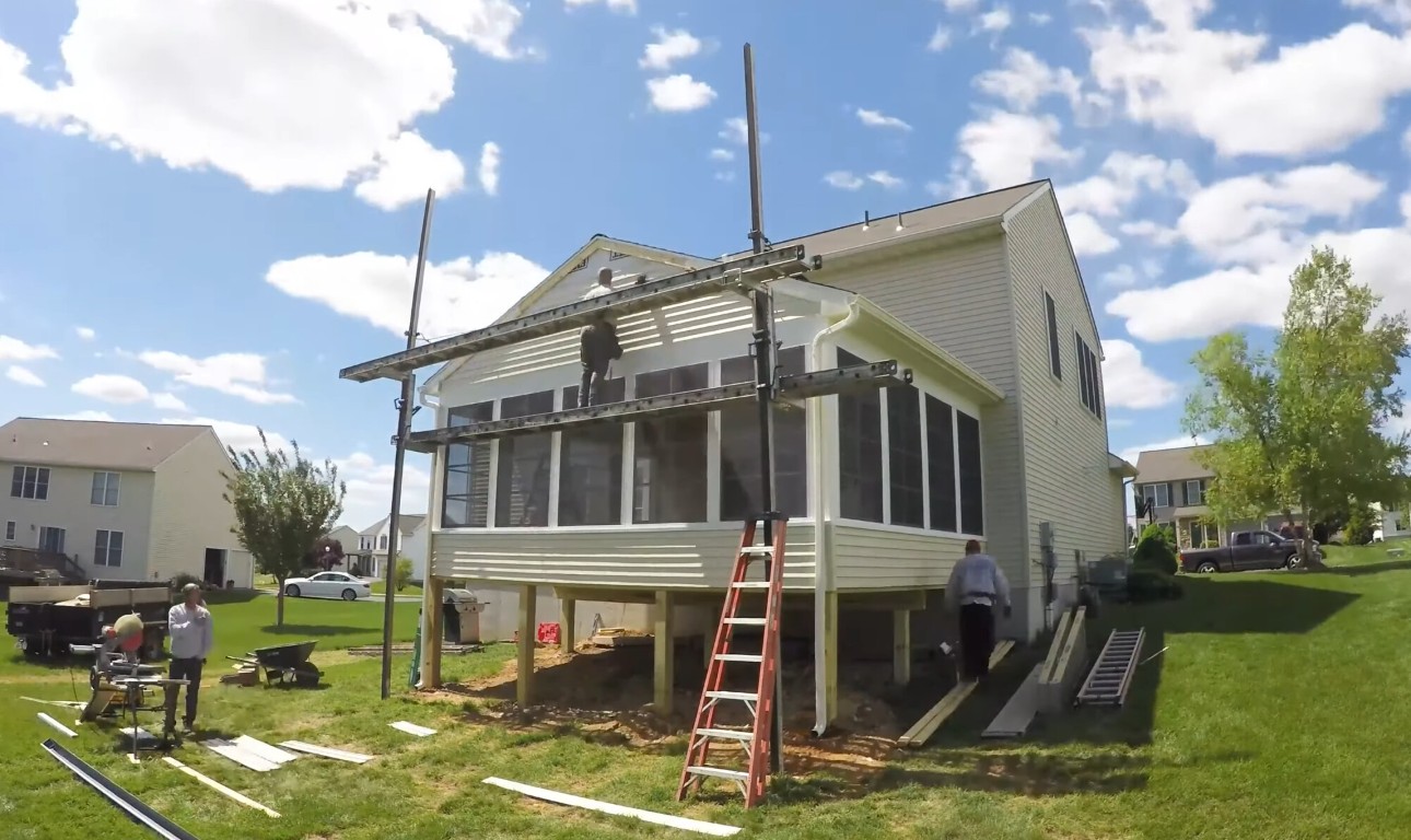 Sunroom repair and glass replacement service in progress